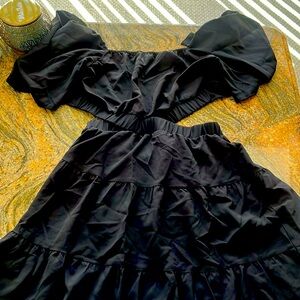 NWT BTFBM . One piece open sides  black ruffle  dress in medium.